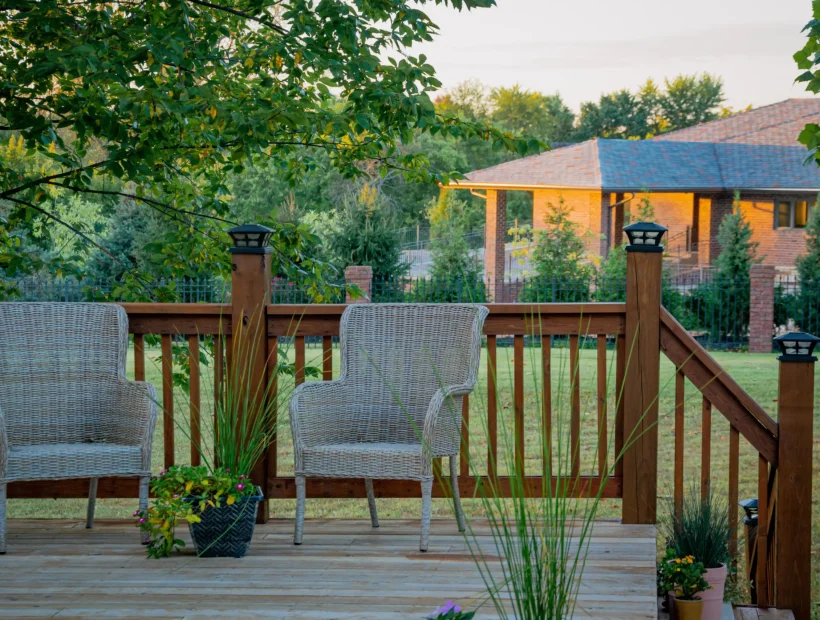 Wooden deck with seating and landscaping for Blount County decks and outdoor living