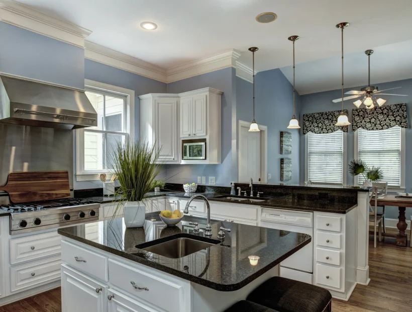 Birmingham AL kitchen remodeling with white cabinetry, island seating, and granite countertops